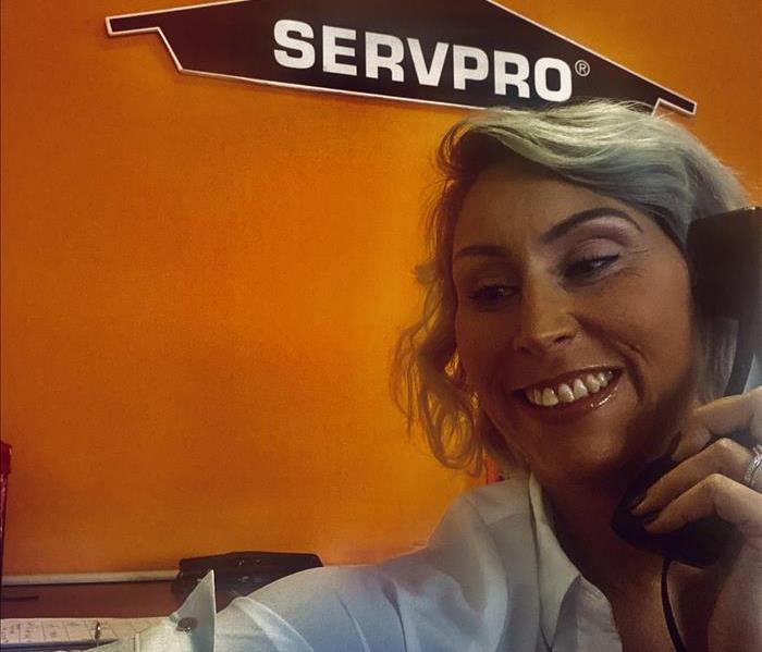 Servpro Office, female employee on phone