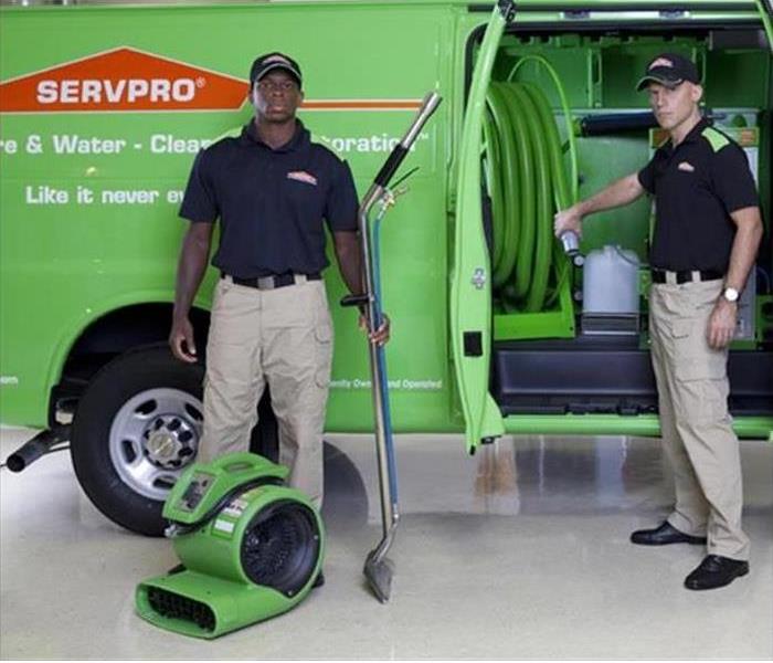SERVPRO employees with equipment